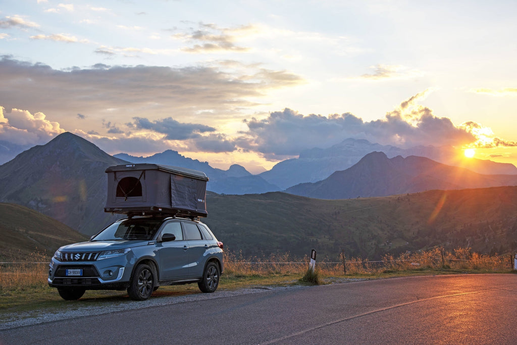 TentBox launches in Europe: A TentBox Classic set up on the side of a road with a dramatic mountain landscape behind.