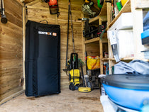 The TentBox GO Storage Bag in a garden shed