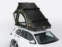 TentBox Cargo rooftop tent in Forest colour on the top of a vehicle