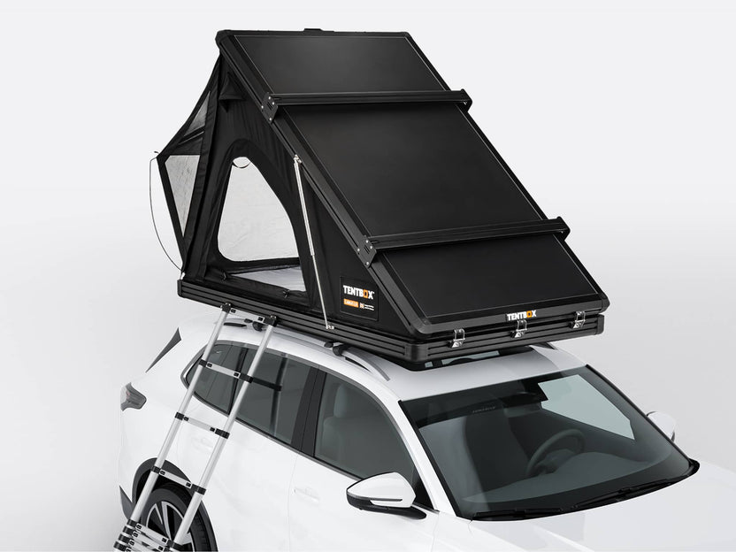 TentBox Cargo rooftop tent in Midnight colour on the top of a vehicle