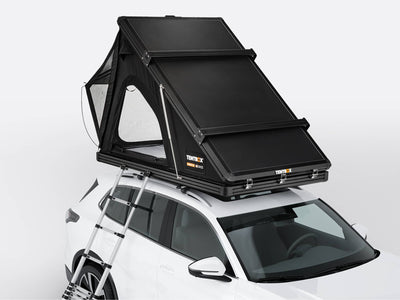 TentBox Cargo rooftop tent in Midnight colour on the top of a vehicle - Roof Tents