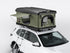 Image showing TentBox Classic roof tent in Forest on the roof of a car