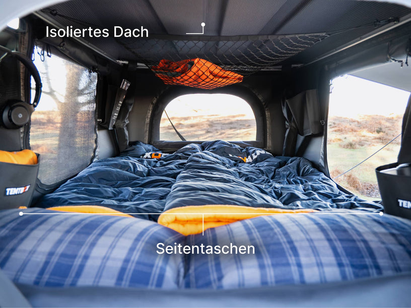  image showcasing the insulated roof lining and side pockets of the TentBox Classic rooftop tent.