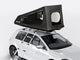 TentBox GO roof top tent attached to a white car with a ladder on a light grey background