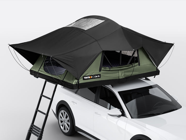 The TentBox Lite XL roof tent in Forest colour option on top of a vehicle
